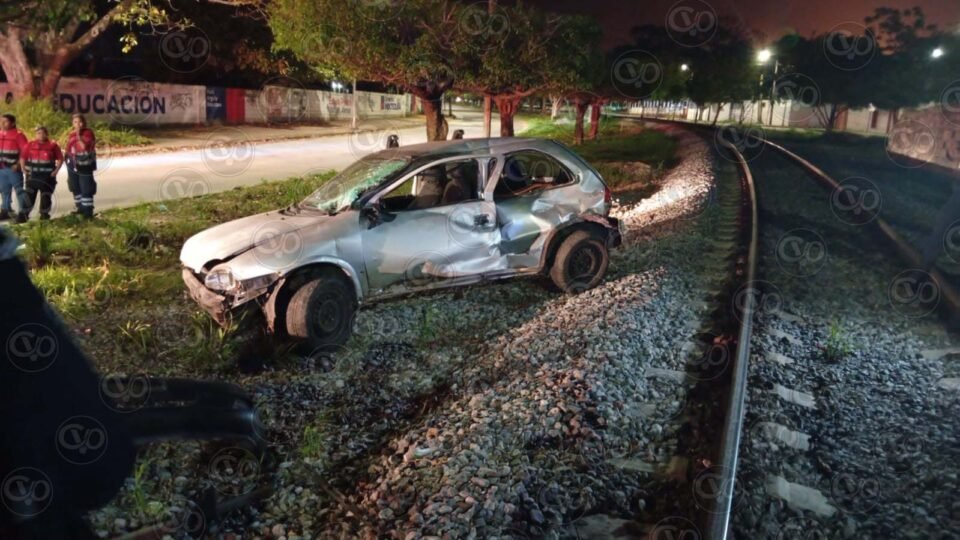 chevy arrastrado por el tren1